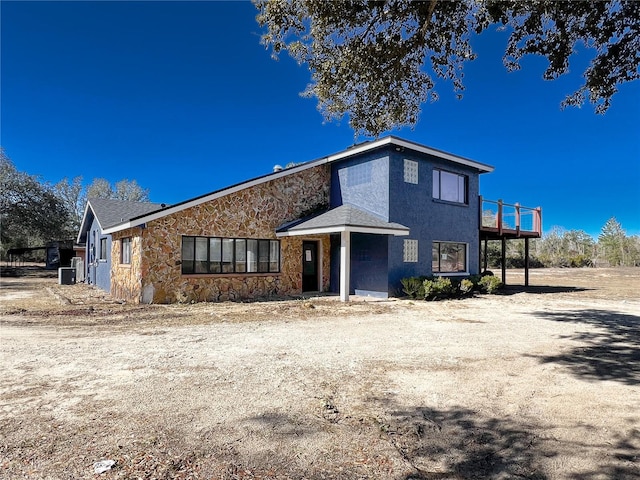 view of front of house featuring central AC unit