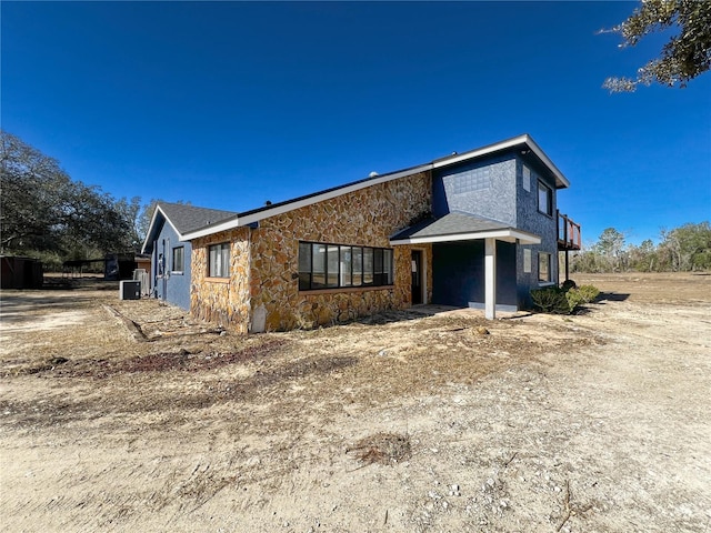 view of front of property with central AC unit