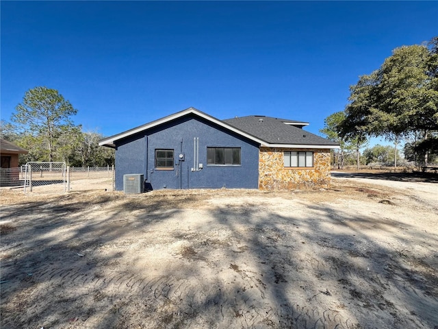 view of property exterior featuring cooling unit