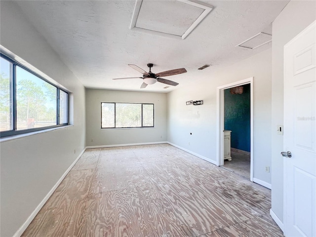 empty room featuring a textured ceiling