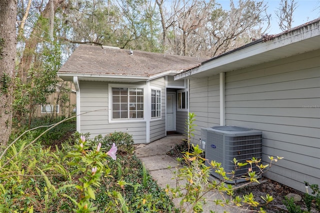 property entrance featuring central AC