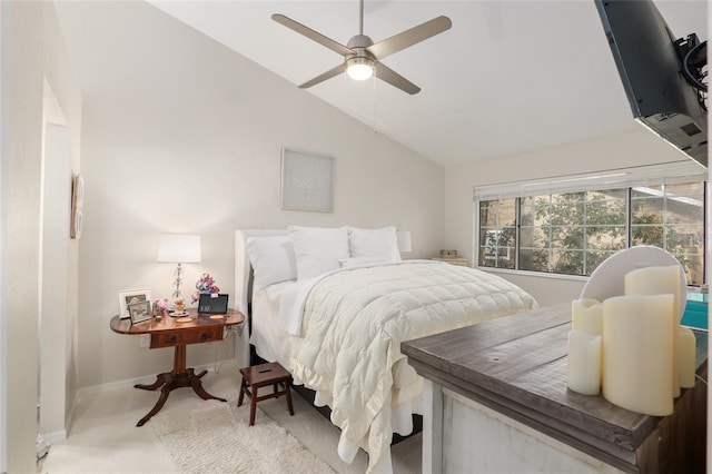 bedroom with lofted ceiling, ceiling fan, and carpet