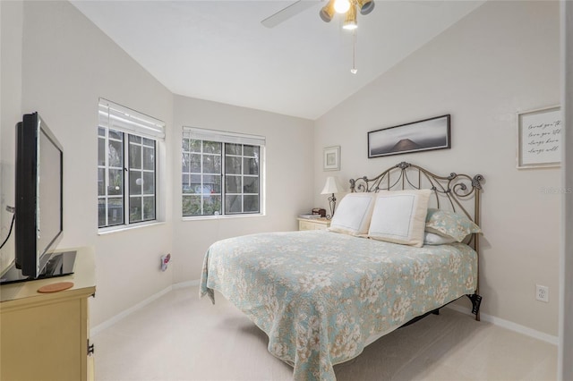 bedroom featuring lofted ceiling, carpet flooring, and ceiling fan