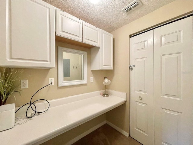 10000 SW 52nd Ave Unit 103, Gainesville, FL 32608 - bathroom featuring visible vents and a textured ceiling