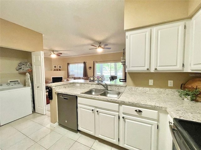 10000 SW 52nd Ave Unit 103, Gainesville, FL 32608 - kitchen with ceiling fan, light tile patterned floors, dishwashing machine, washer / clothes dryer, and a sink