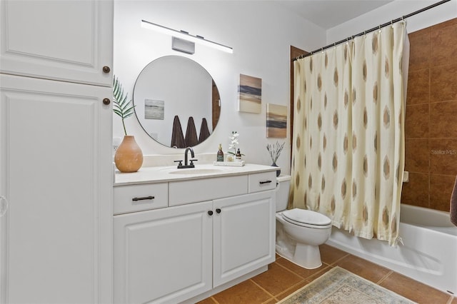 full bathroom featuring tile patterned flooring, vanity, toilet, and shower / bath combo