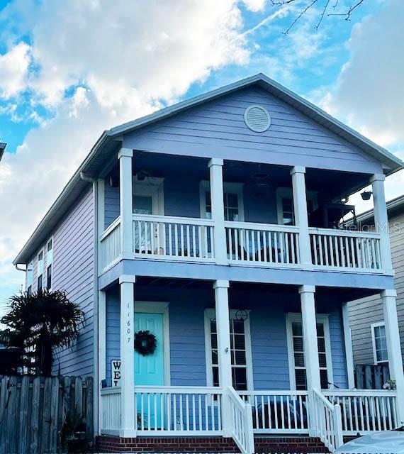 view of front of house with a balcony and a porch