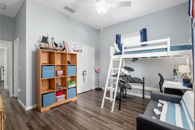 bedroom with dark wood-type flooring and ceiling fan