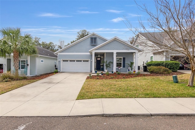 1334 NW 121st Way, Gainesville, FL 32606 - view of front of property with a porch, an attached garage, driveway, and a front lawn