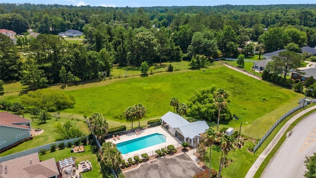 1334 NW 121st Way, Gainesville, FL 32606 - bird's eye view of a pool area and a forest