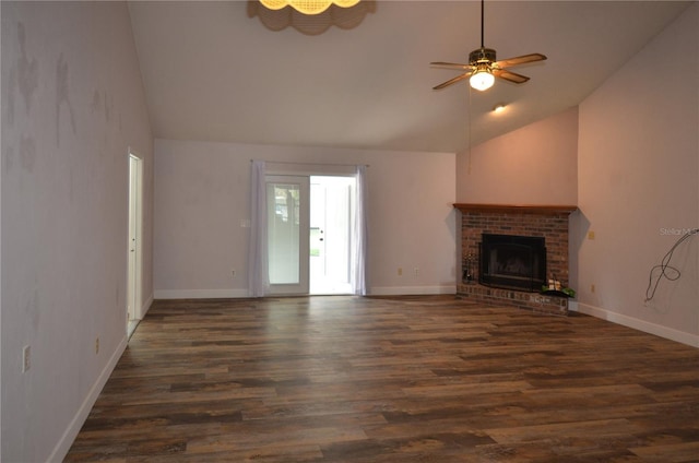 unfurnished living room featuring dark wood-style floors, ceiling fan, a fireplace, and baseboards