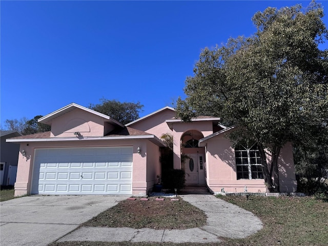 view of front of property featuring a garage