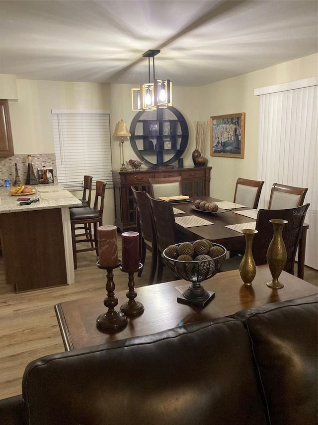 dining room featuring light wood-style floors