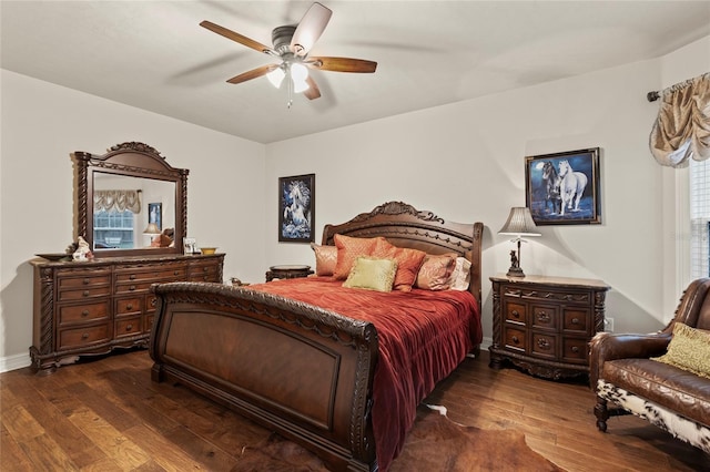 bedroom featuring dark wood-type flooring and ceiling fan