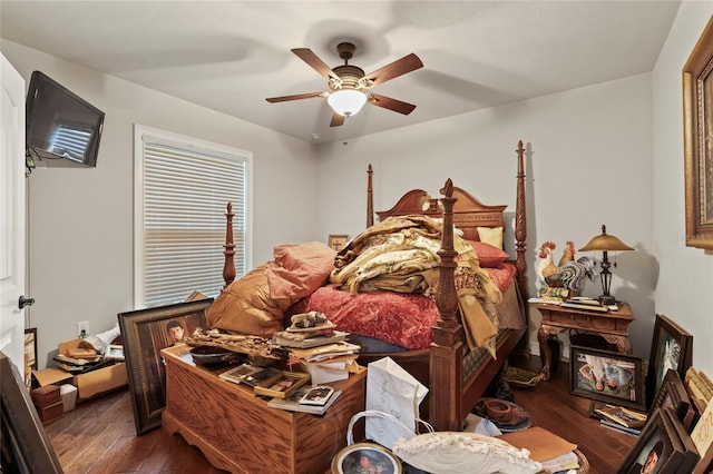 bedroom featuring dark wood-type flooring and ceiling fan