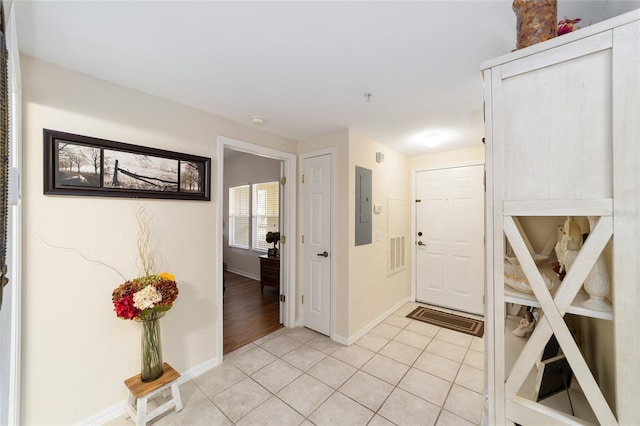 tiled entrance foyer with electric panel