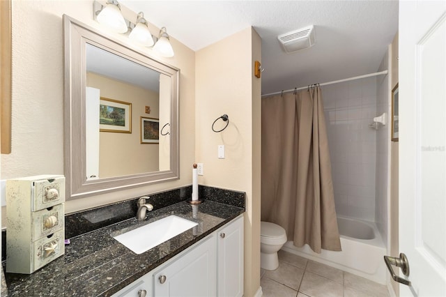 full bathroom featuring shower / tub combo with curtain, vanity, toilet, and tile patterned flooring