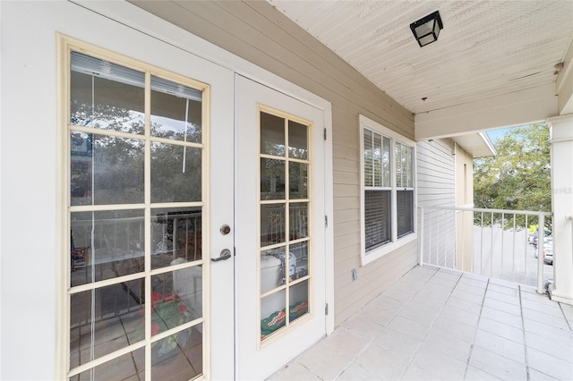 balcony featuring french doors