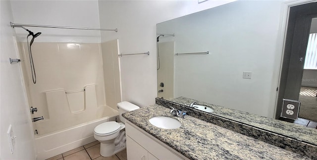 full bathroom with shower / tub combination, vanity, tile patterned floors, and toilet