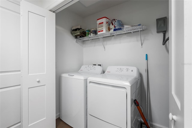 clothes washing area with independent washer and dryer