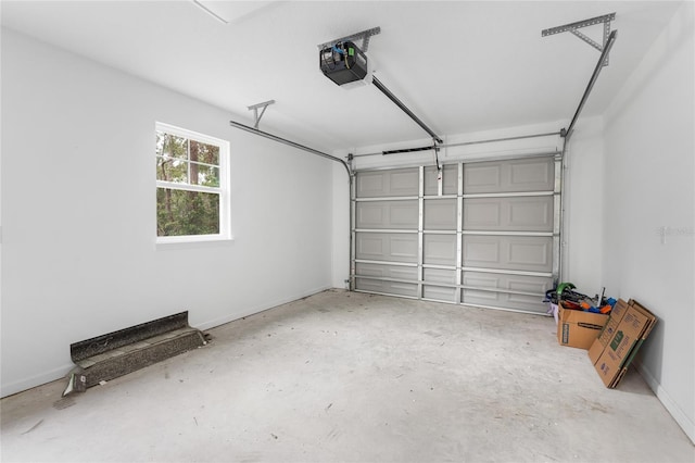 garage featuring a garage door opener