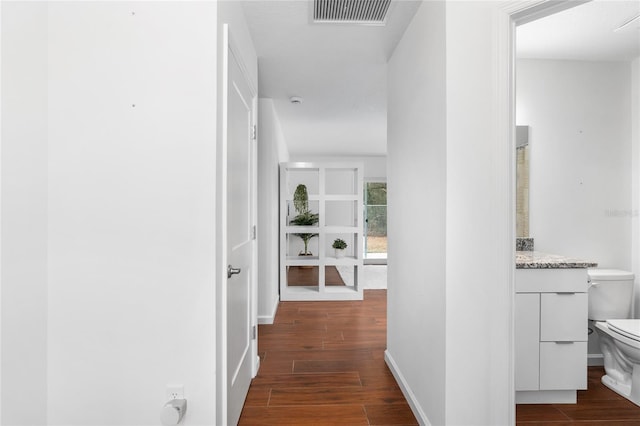 hall featuring dark hardwood / wood-style floors