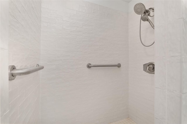 bathroom with tiled shower