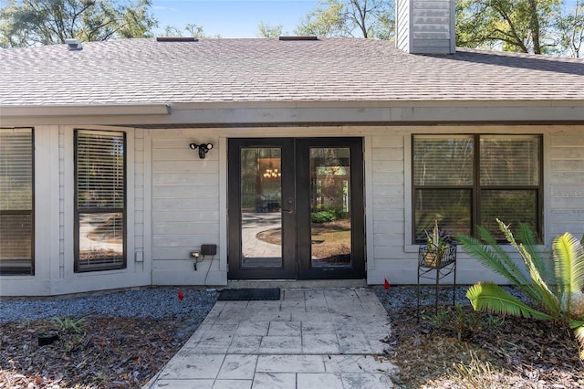 doorway to property featuring french doors