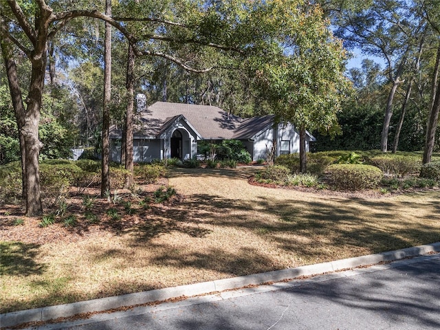 view of front of home with a front yard