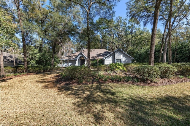 view of front of house with a front lawn