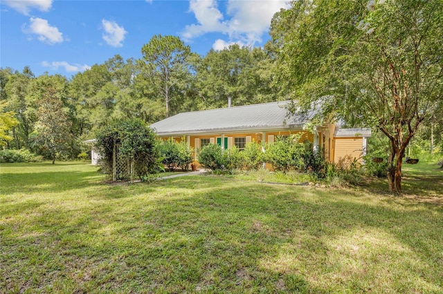 view of front of property with a front lawn