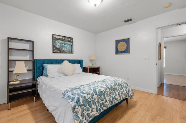 bedroom featuring hardwood / wood-style floors