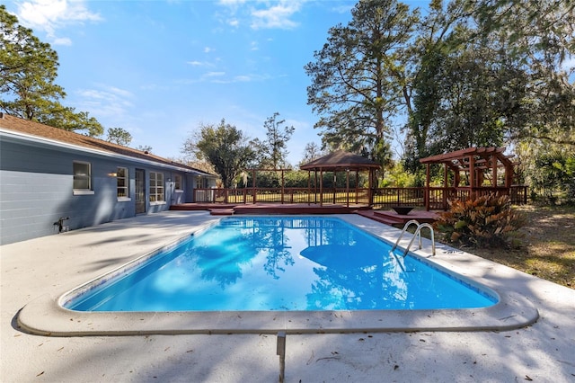 view of swimming pool with a gazebo