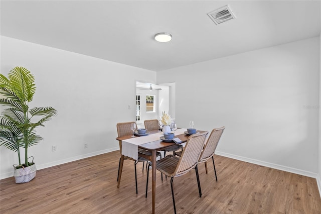 dining room with light wood-type flooring