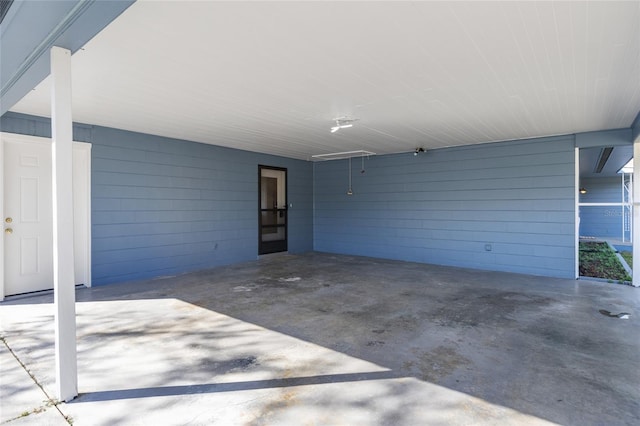 exterior space featuring a carport