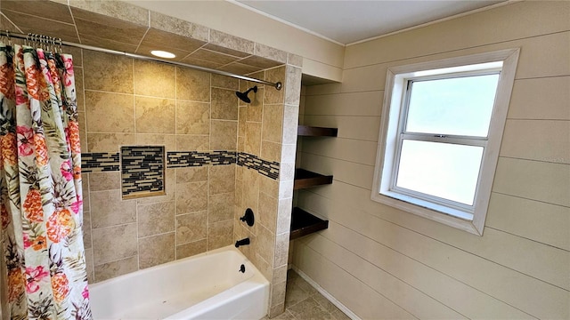 bathroom with shower / bathtub combination with curtain