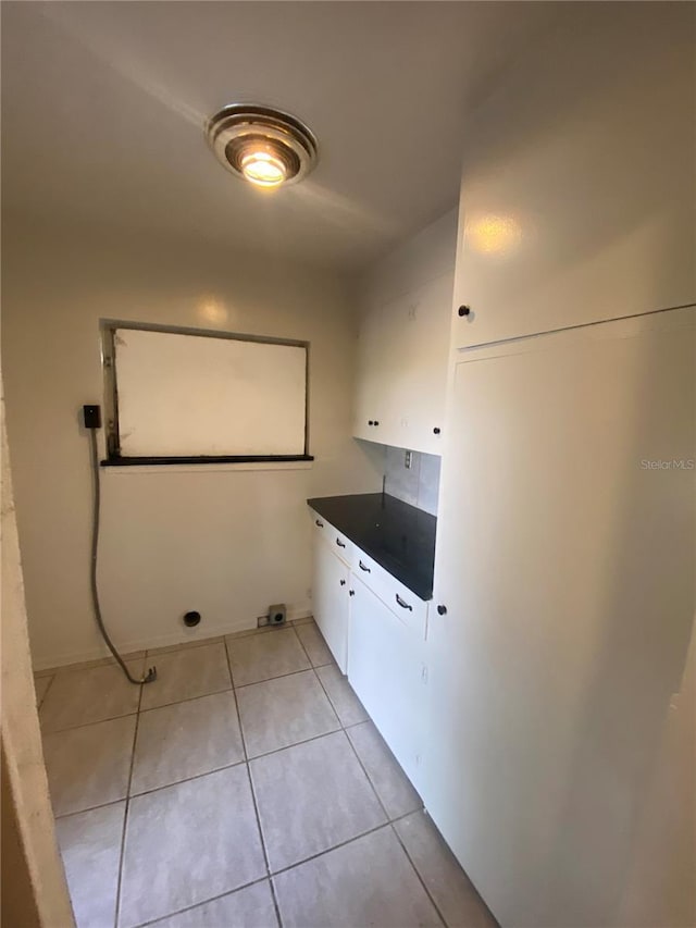 washroom featuring light tile patterned floors