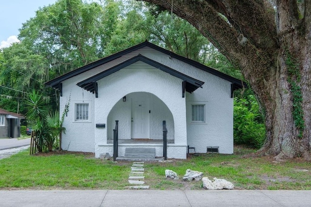 view of front of home with a front yard