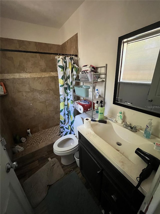 120 NW 9th St, Gainesville, FL 32601 - bathroom with a shower stall, toilet, and vanity