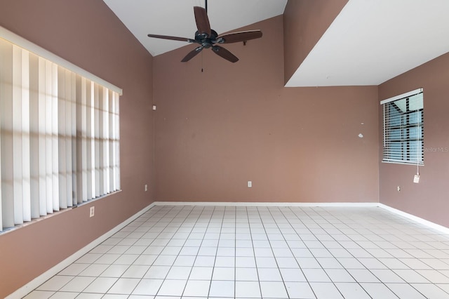 tiled empty room with ceiling fan