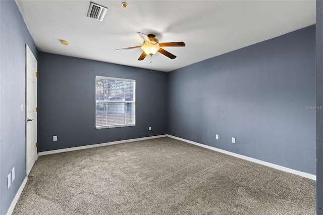 carpeted empty room with ceiling fan