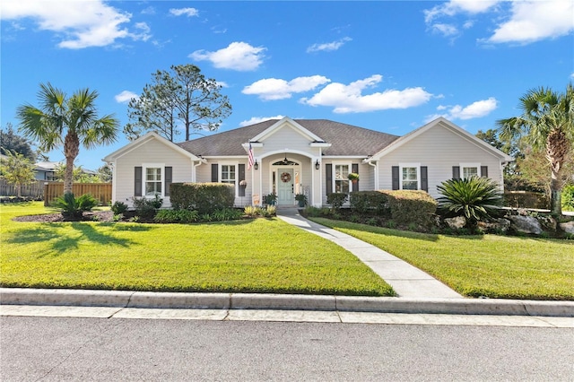 ranch-style home with a front yard