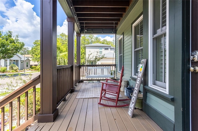 deck featuring covered porch