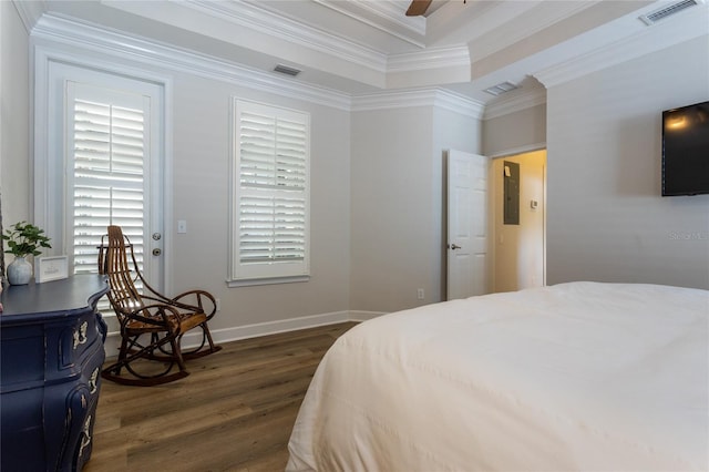 bedroom featuring baseboards, dark wood-style flooring, visible vents, and crown molding