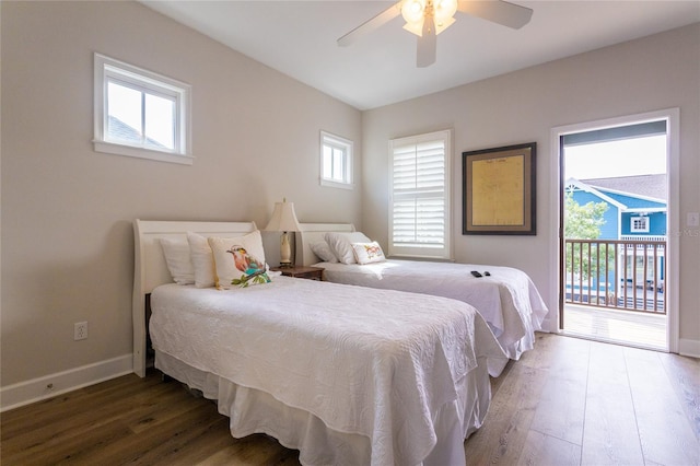 bedroom featuring access to outside, baseboards, ceiling fan, and wood finished floors