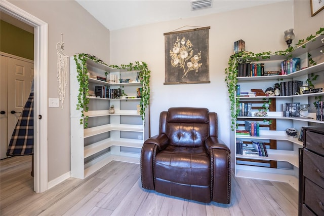 sitting room with light wood-type flooring