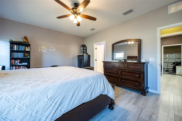 bedroom featuring ceiling fan and light wood-type flooring