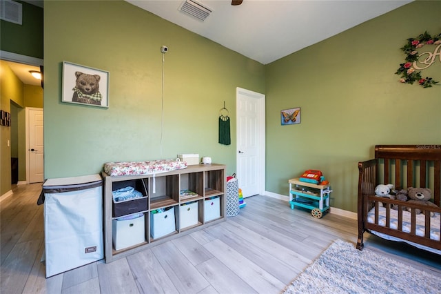 bedroom with light wood-type flooring