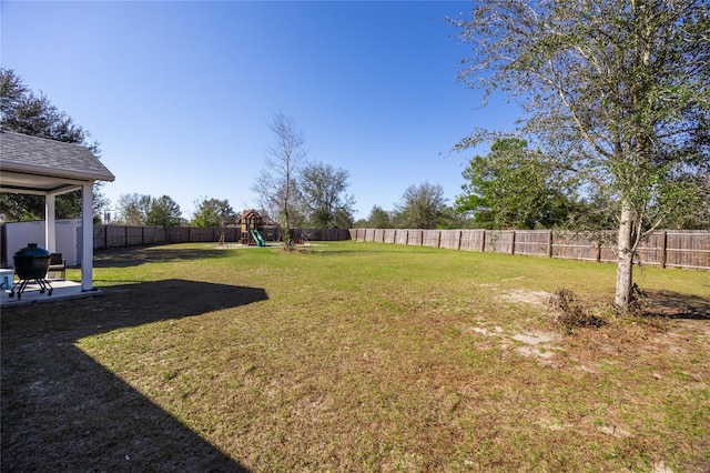 view of yard featuring a playground