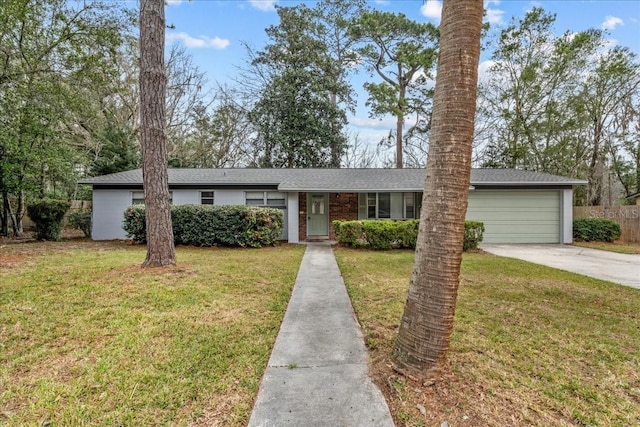 ranch-style home with a garage and a front yard